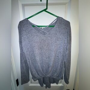 NWT- long sleeve top, crisscross front detail, hi-low in front/back